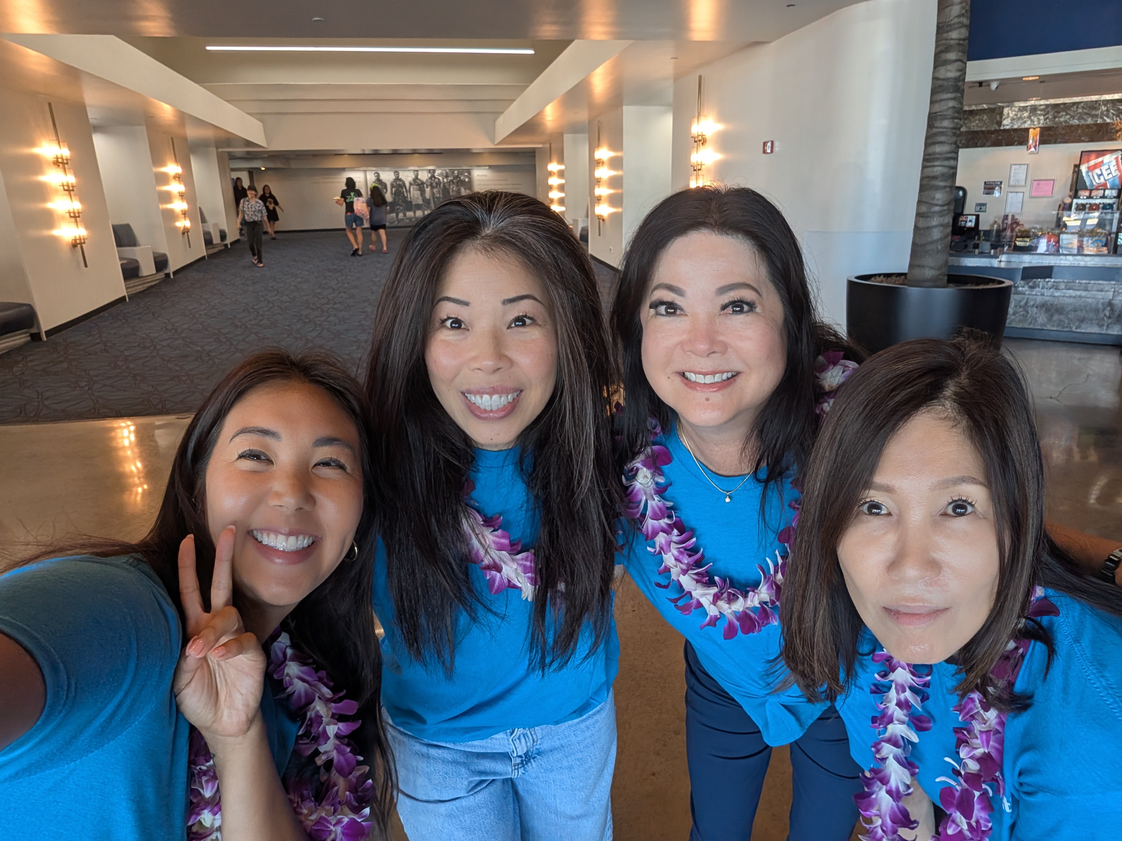 Locations agents and volunteers with Big Brothers Big Sisters Hawaii families at Toy Story 5 Movie Day