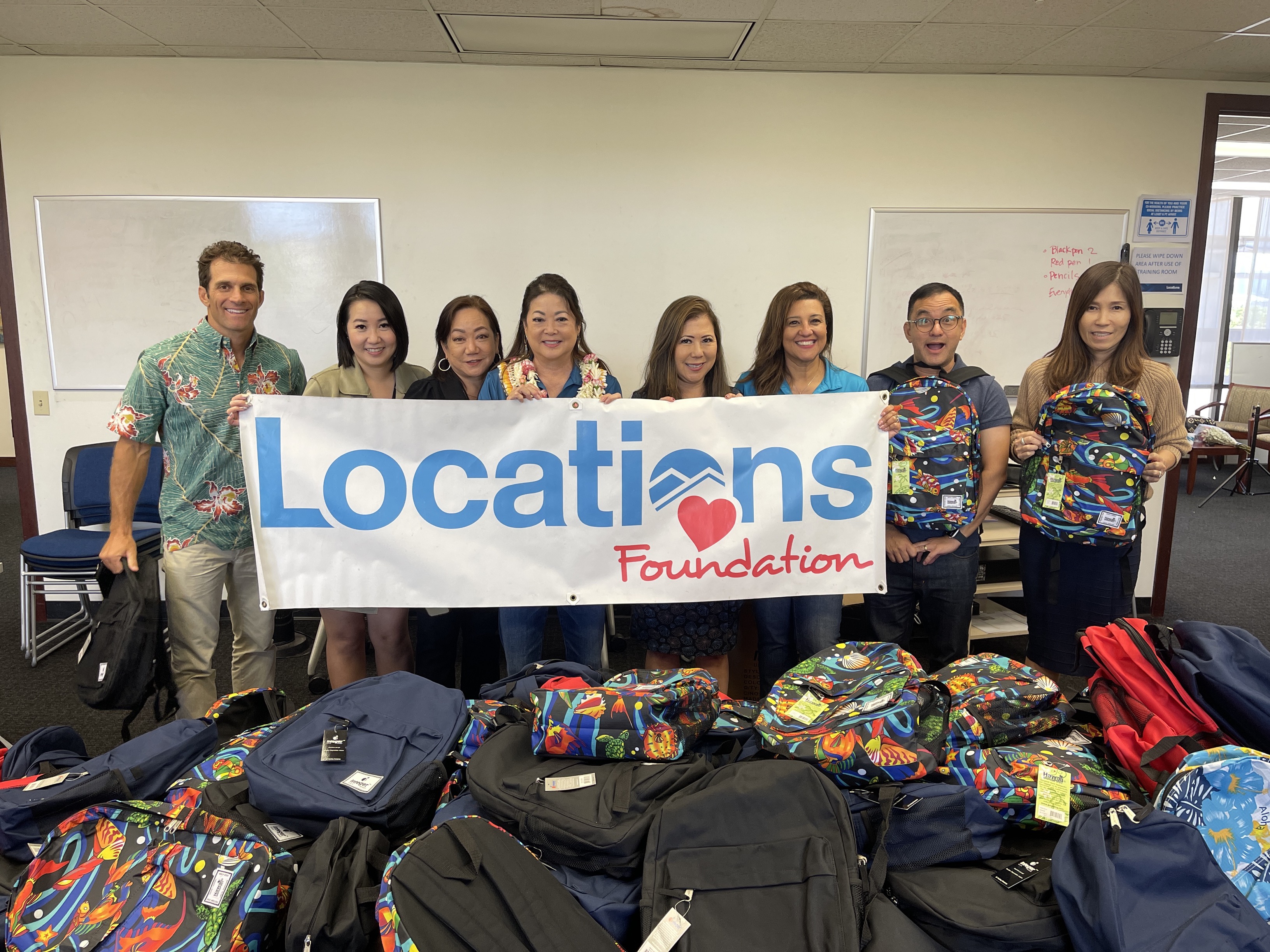 Foundation volunteers with backpacks