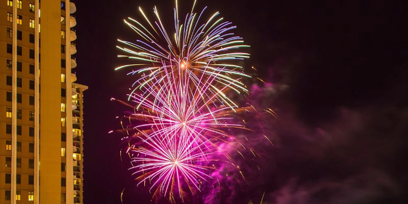 Fourth of July fireworks over ocean in Hawaii